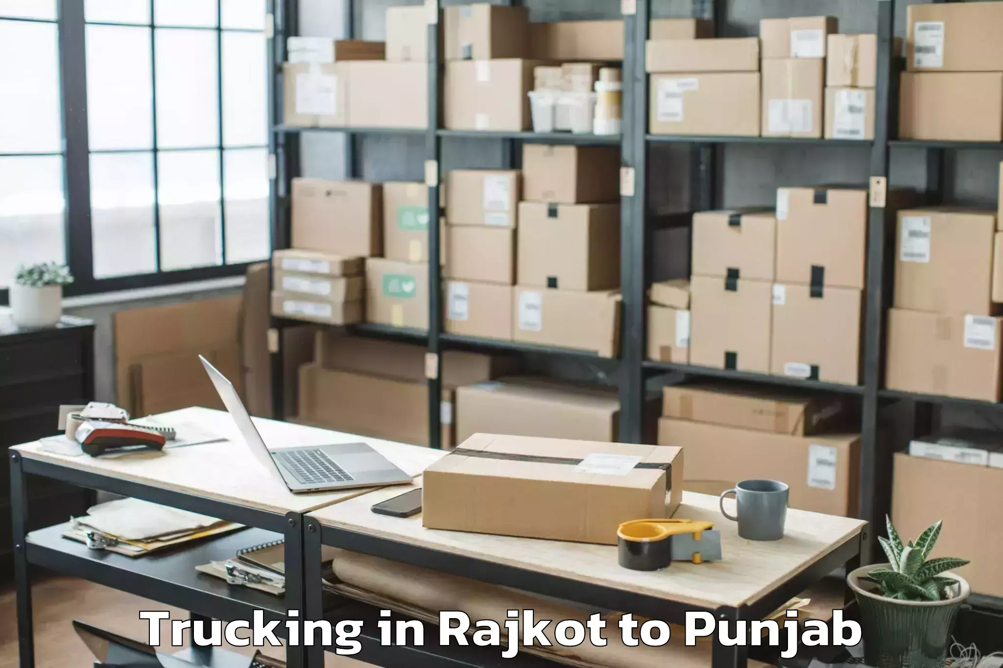 Leading Rajkot to Raja Sansi Airport Atq Trucking Provider